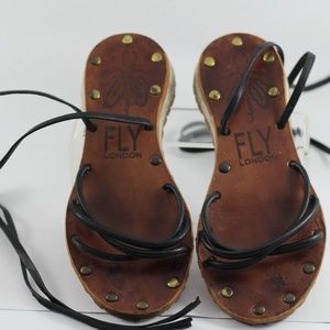 Fly London strappy lace-up sandals.